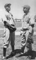 Satchel Paige Welcomes Jackie Robinson to the Kansas City Monarchs.
